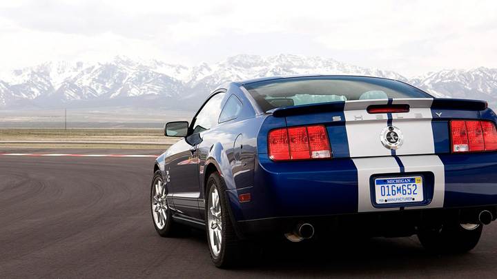 Back Pose Of 2008 Ford Shelby GT500KR In Blue On Race Course